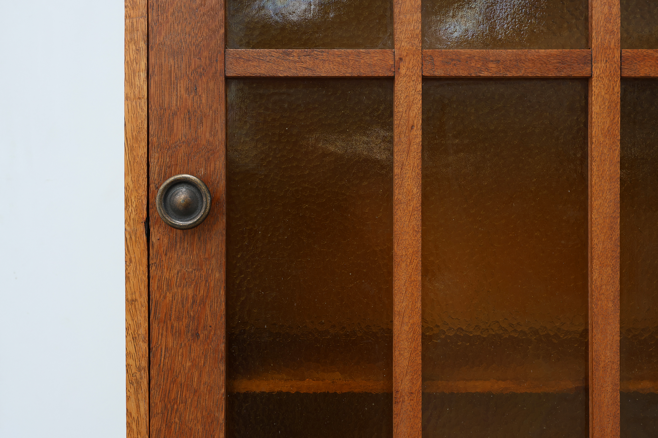 Art Deco oak wall cabinet with amber glazed door, Belgium ca. 1925thumbnail